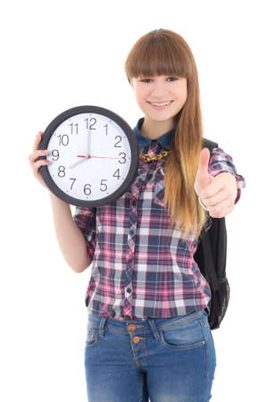 cute teenage girl with clock thumbs up isolated on white backgroundの写真素材