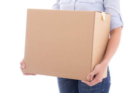 cardboard moving box in woman hands isolated on white background