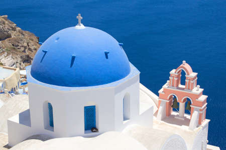 Blue roof church on Santorini island in Greeceの写真素材