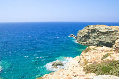 beautiful view of rocky cliff and transparent sea water on Crete island