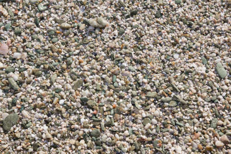 close up of little stones on beach