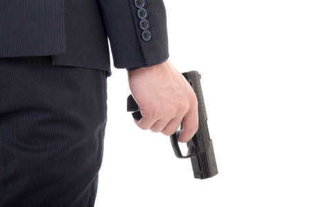 gun in business man hand isolated on white backgroundの写真素材