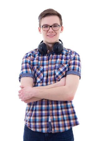 portrait of handsome teenage boy with headphones isolated on white backgroundの写真素材