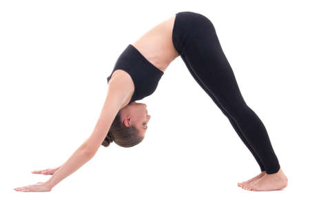 young woman in yoga pose isolated on white backgroundの写真素材