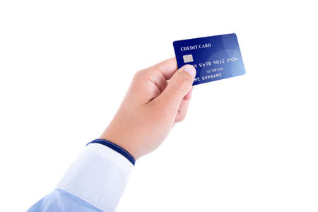 male hand giving plastic credit card isolated on white backgroundの写真素材