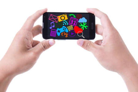 hands holding mobile smart phone with media icons and applications on screen isolated on white...