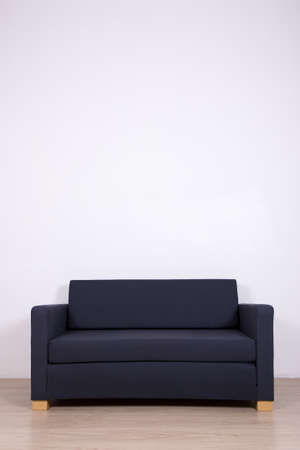 double sofa in room over white wall background with copy spaceの写真素材