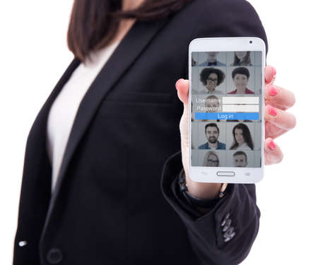 young business woman showing smart phone with login panel isolated on white backgroundの写真素材