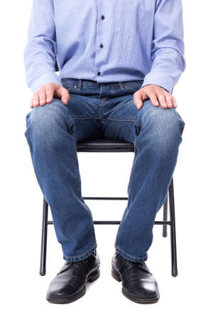 business concept - man sitting on office chair isolated on white backgroundの写真素材
