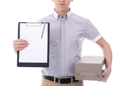 post delivery service man holding blank clipboard and cardboard box isolated on white backgroundの写真素材