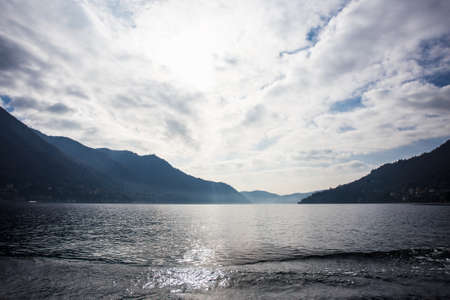 beautiful evening view of mountains and Como Lake in Italyの写真素材