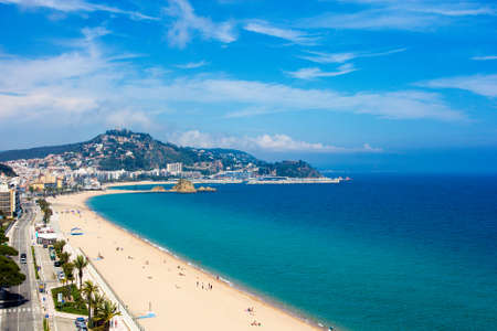 beautiful aerial view of beach and town Blanes, Costa Brava, Catalonia, Spain - May 23, 2018: City...