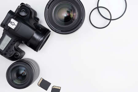 photography equipment and copy space over white table backgroundの写真素材