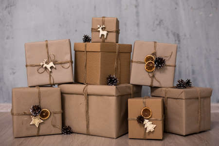 close up of gift boxes over gray wall backgroundの写真素材