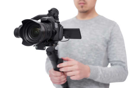 portrait of male photographer or videographer with modern dslr camera isolated on white background