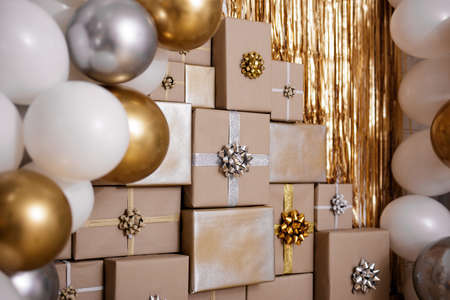 christmas or birthday decoration - decor of presents with silver and golden air balloonsの写真素材