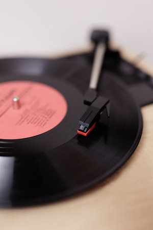 Vintage portable record player playing a old vynil recordの写真素材