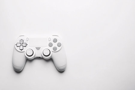 white gamepad joystick over white backgroundの素材