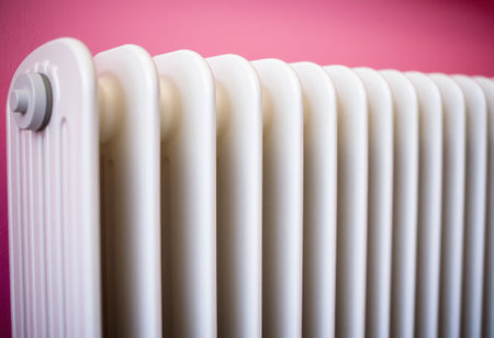 close up of white central heating radiator, home heating and temperature control conceptの素材