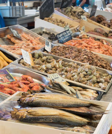 boxes of fresh fish for sale on the quay at the marketの写真素材