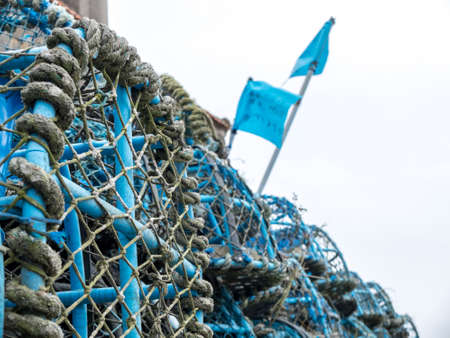 Stacked fishing netsの写真素材
