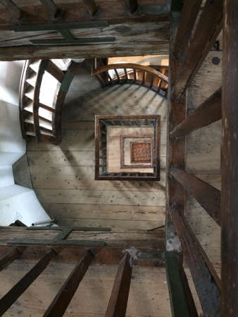 Top view of the internal wooden spiral stairwell trumpet to an ancient navigation lighthouseの写真素材