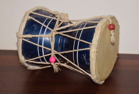 Damaru or Damroo is a small two-headed drum which is also the instrument of the deity Lord Shiva and considered holy in Hinduismの写真素材