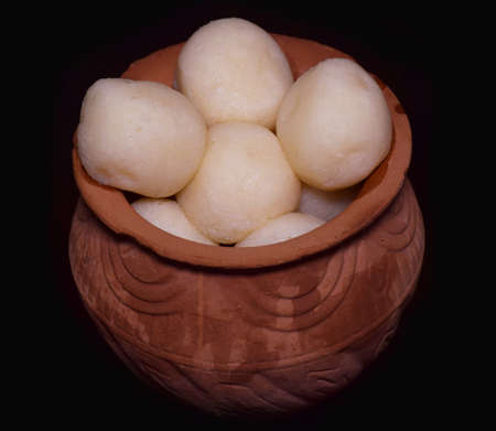 Bengali Dessert spongy Rosogolla served in Clay Pot or Earthenwareの写真素材