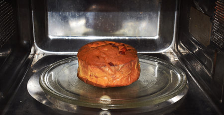 Baking a Fruit Cake inside an oven  for Christmas celebrationの写真素材
