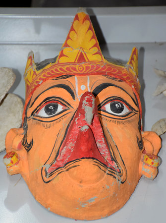 Traditional Mask which are known as Mukha locally in Assamese culture displayed at orchid park in Kazirangaのeditorial素材