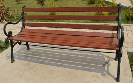 An empty bench at a park in Indiaの写真素材