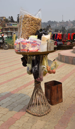 Cart of a puffed rice vendor a local snack at a park in Indiaのeditorial素材