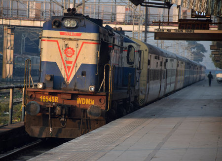 Scene of Indian railways where a train is stationed at a platformのeditorial素材