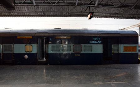 Indian Luggage coach is standing at a platform