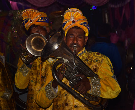 Band Artist performing  during a marriage function in Indiaのeditorial素材