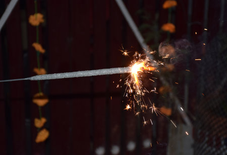 A Sparkler also known as Phuljhari in Hindi is glowing during Diwali  festival in Indiaの写真素材