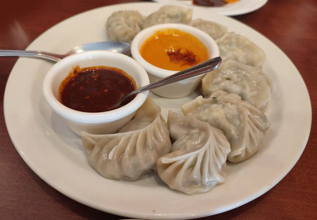 Delicious Chicken Momos served at a restaurantの写真素材