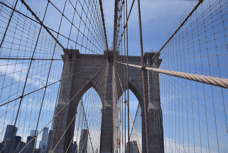 The beautiful Brooklyn Bridge on a clear day in Newyorkの写真素材