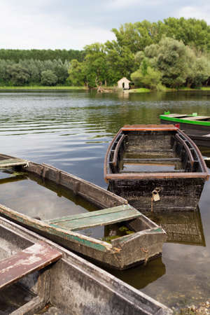 Wooden fishing boats at the Danube river, Serbia の写真素材