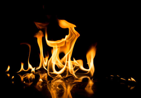 Burning fire on black background.の写真素材