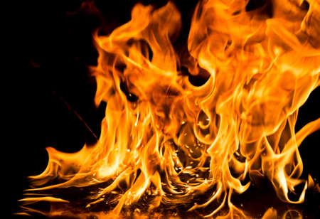 Burning fire on black background.の写真素材