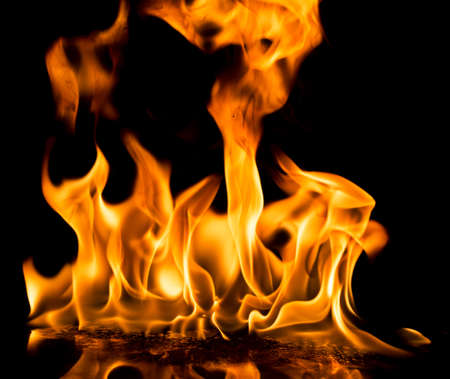 Burning fire on black background.の写真素材
