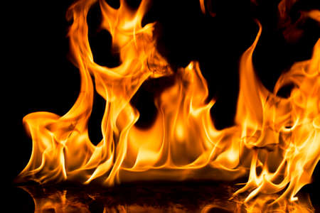 Burning fire on black background.の写真素材