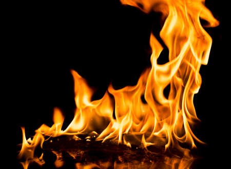 Burning fire on black background.の写真素材