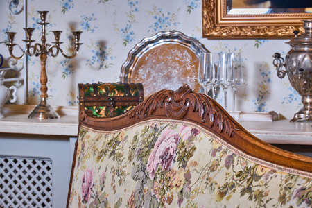 Old antique sofa photographed with flash in restaurantの写真素材