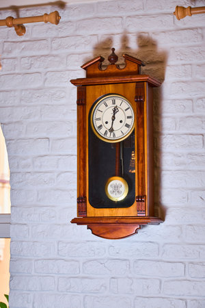 Photo of an old antique clock in a restaurant