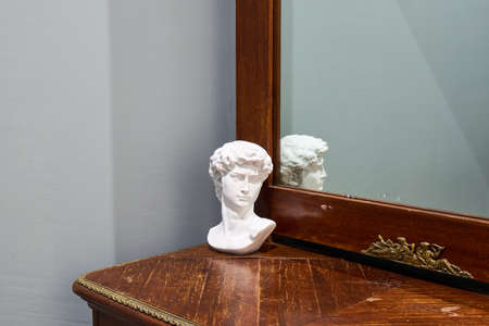 Photo of a bust standing in the hallwayの写真素材