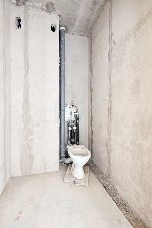 Interior of new apartment without finishing in gray tonesの写真素材