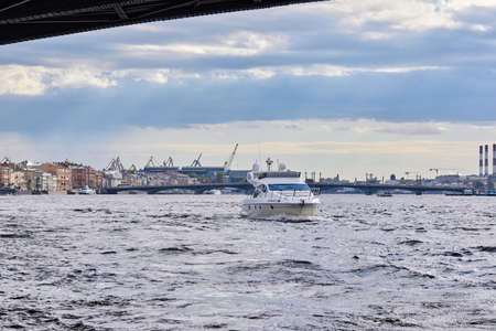 Luxury private motor yacht sailing in the riverの写真素材