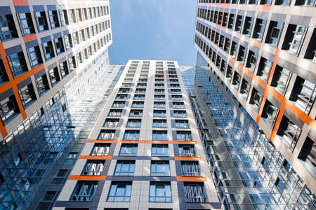 Photo of a residential high-rise building on a summer day